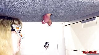 Mistress ties heavy objects to balls on the milking table